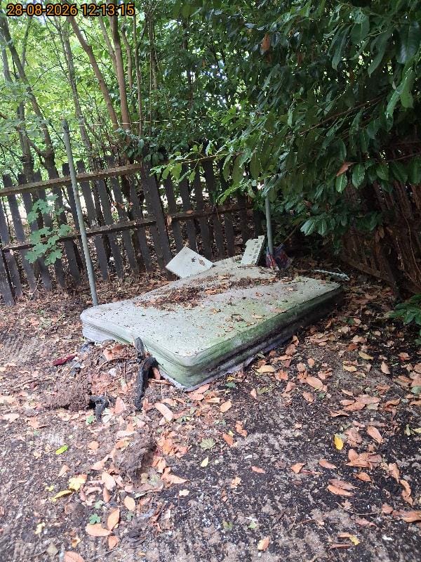 Fly-tipped mattress removal before clearance