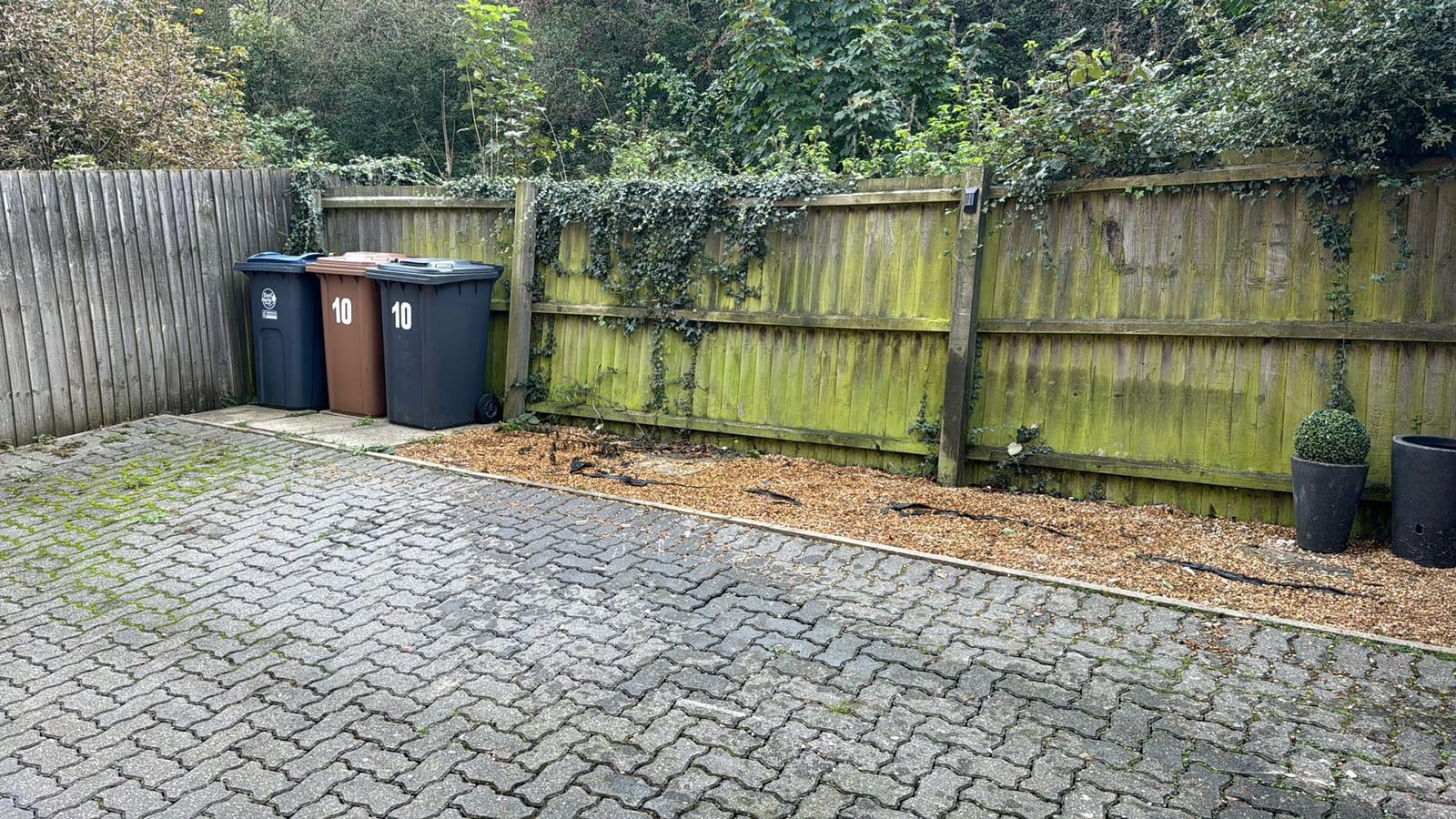 A cleared, tidy domestic driveway after a house clearance